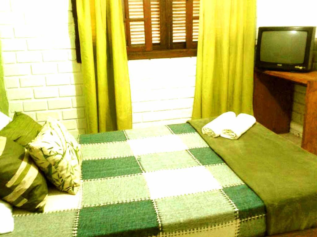 Pousada Terra Linda Praia do Rosa Habitación foto